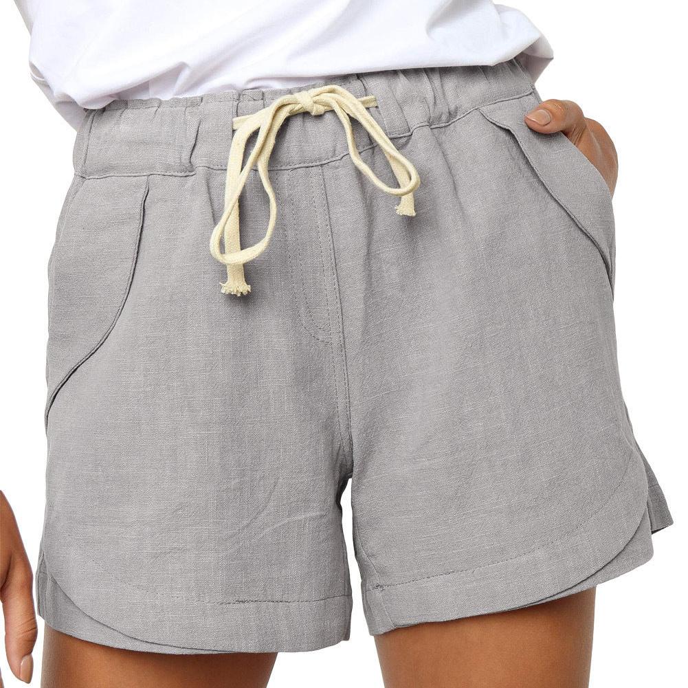 Højtaljede shorts med knapper