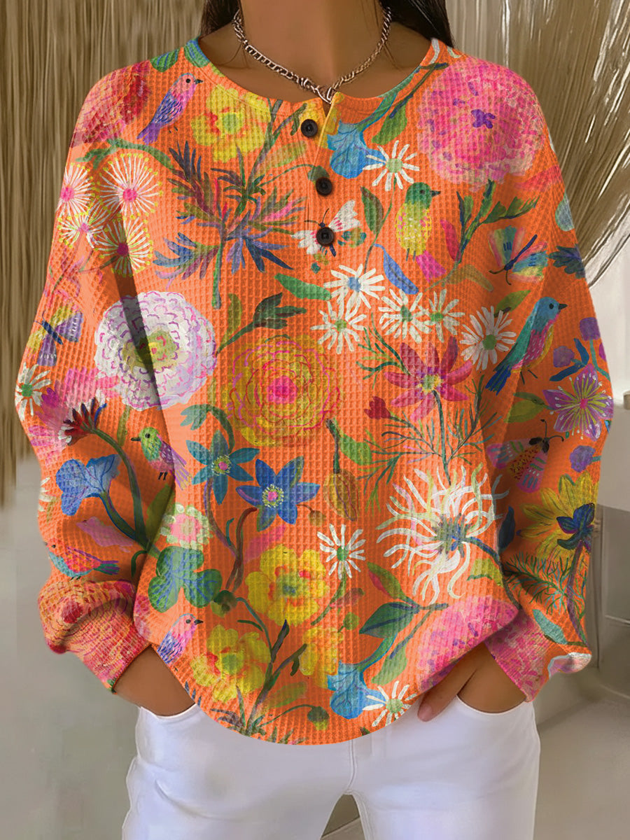 Pullover med farverigt blomstermønster