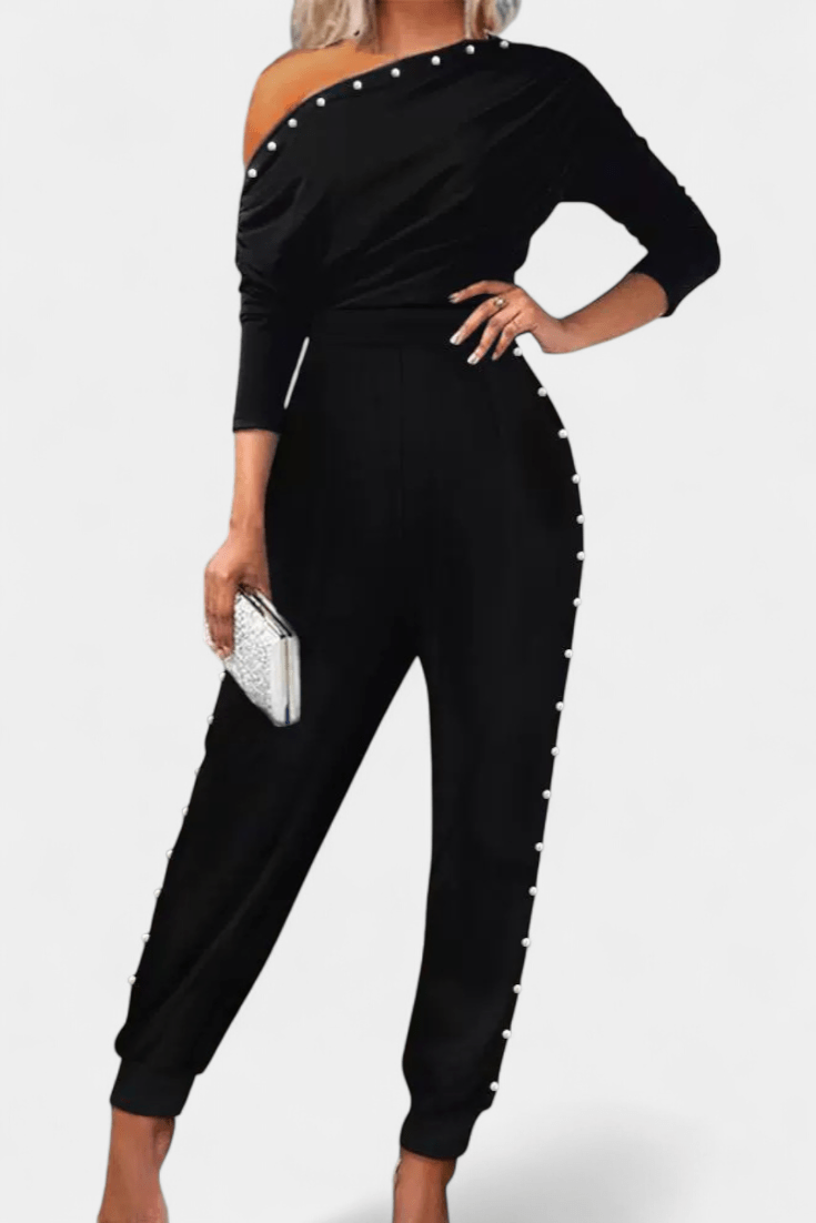Asymmetrisk jumpsuit