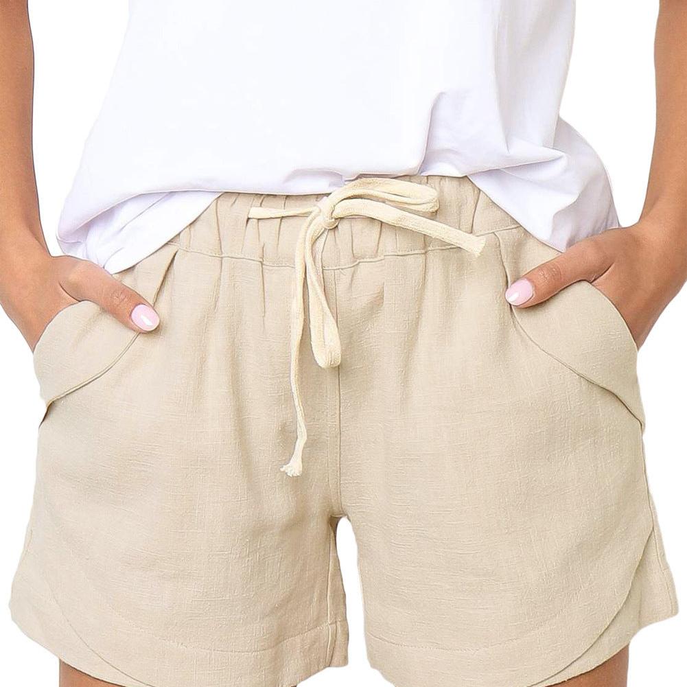 Højtaljede shorts med knapper