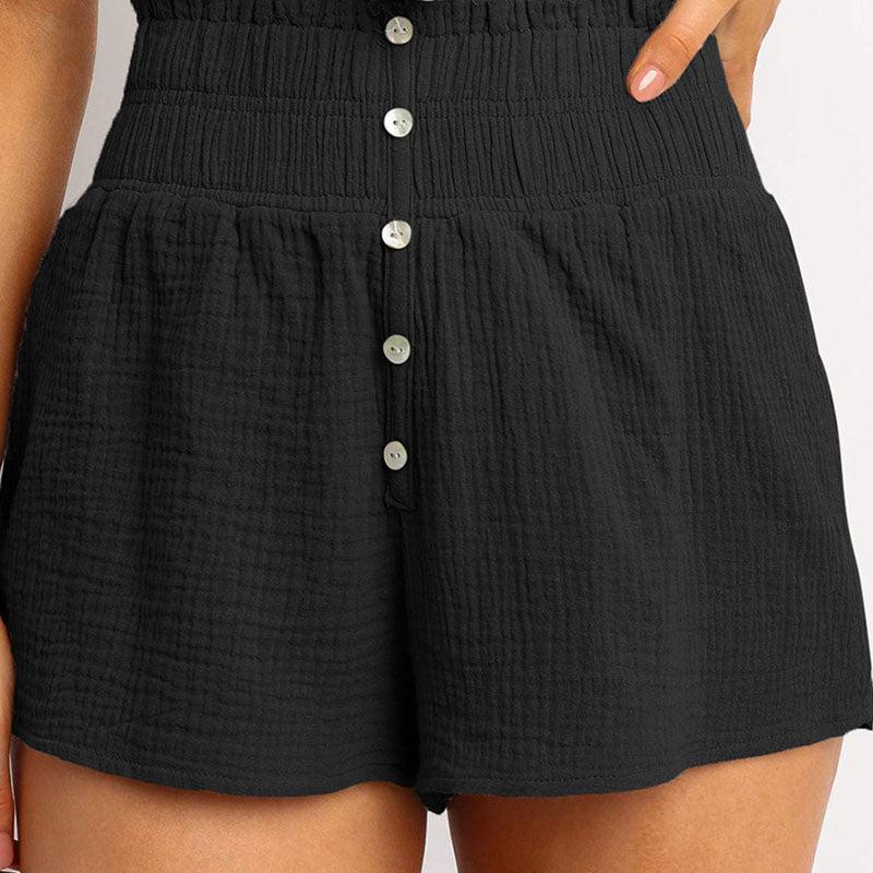 Højtaljede shorts med knapper
