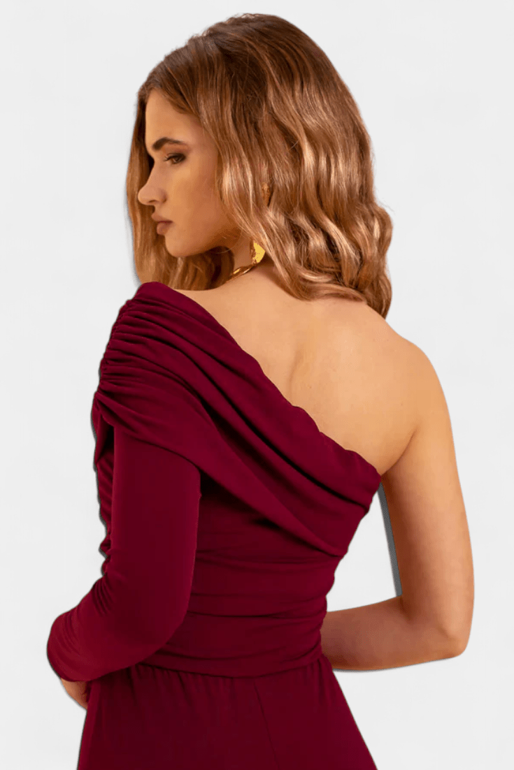 Heldragt med en skulderstrop